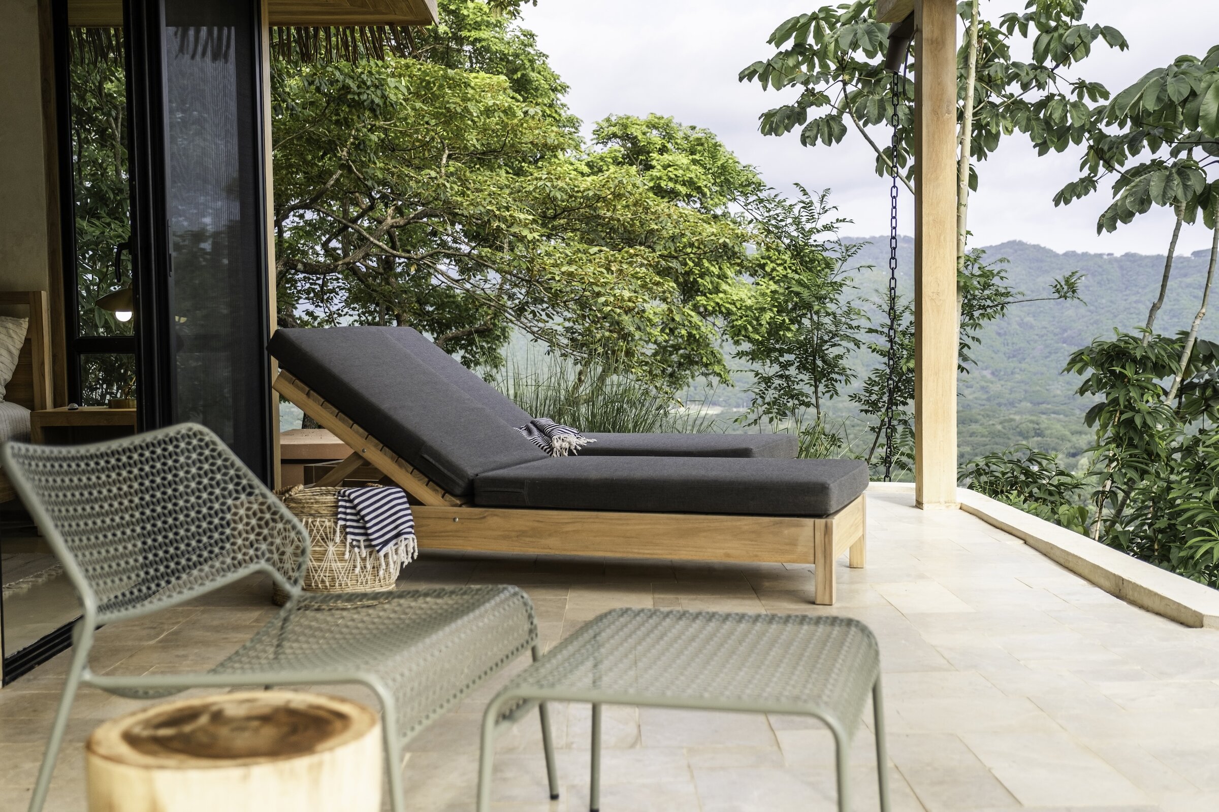 Rattan chair against a textured wall